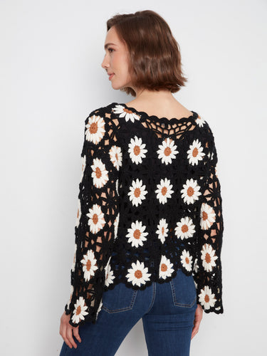 Scalloped hem details bring a touch of sophistication to this delightful crochet piece, perfect for any wardrobe by Charlie B.