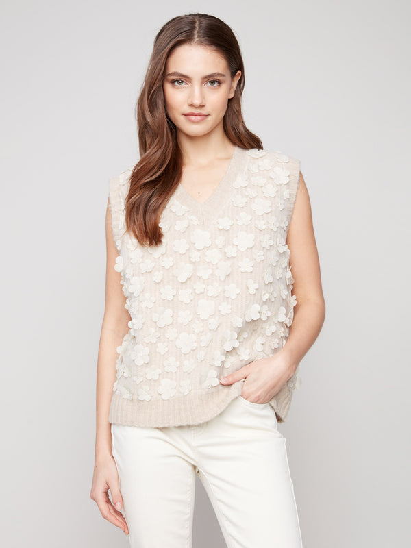 Floral mesh sweater vest with sleeveless style, offering a chic and airy look by Charlie B.