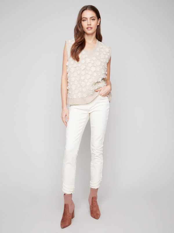 Charming drop shoulder design enhances the relaxed fit of this floral mesh sweater vest by Charlie B.