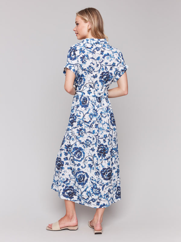 Maxi length floral dress showcasing a unique button-front detail by Charlie B.