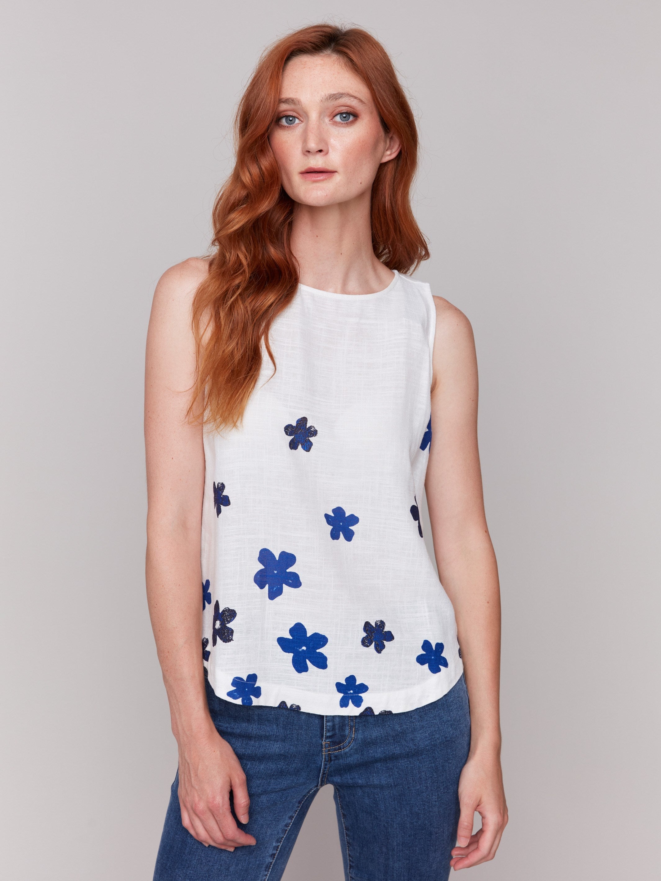 Floral pattern sleeveless top with crew neckline by Charlie B.
