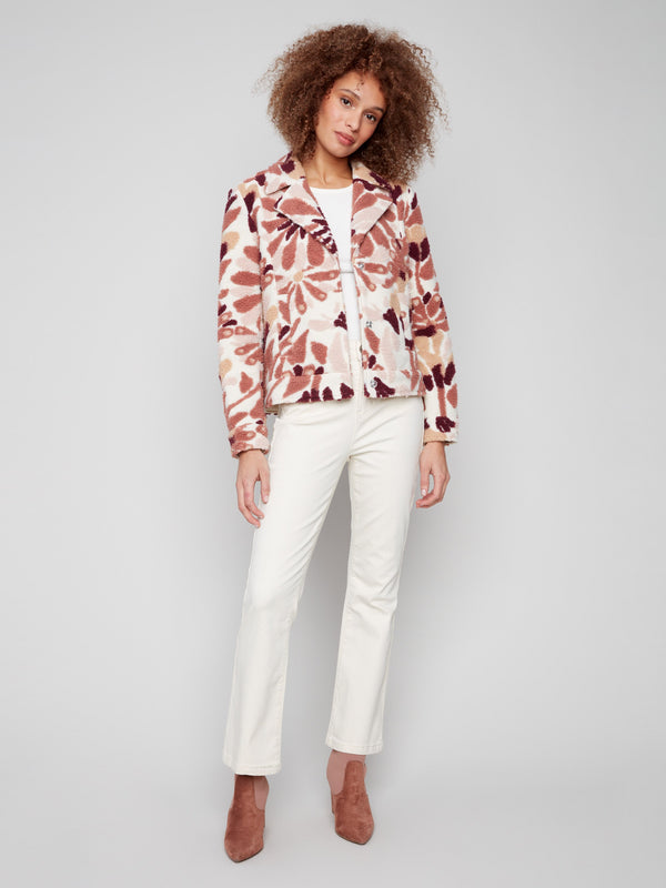 Chic floral sherpa fleece coat with open sleeve cuffs that add a modern flair to your outfit by Charlie B.
