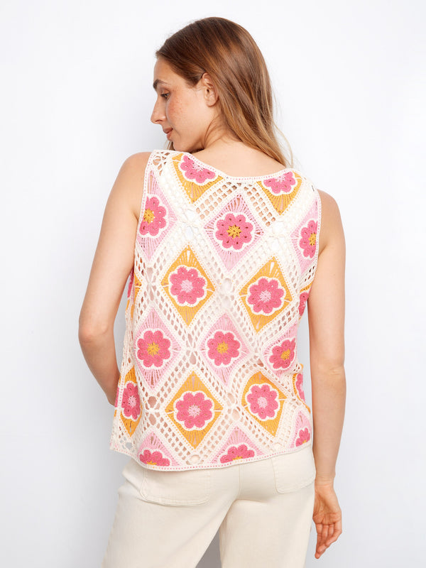 Embrace the season in this lively floral-patterned piece, highlighted by its comfortable crew neckline and breezy fit. By Charlie B.