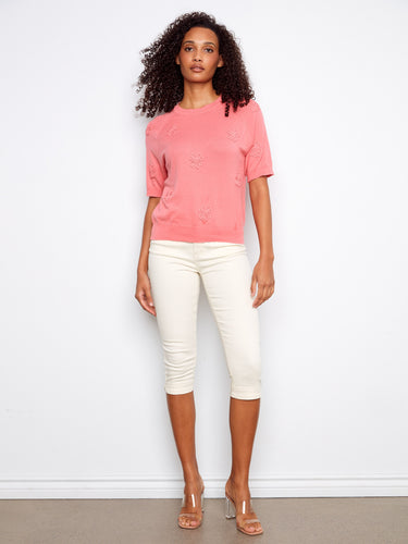 Elegant pink top with applique embroidery, designed in soft 100% cotton fabric for a chic look. By Charlie B.