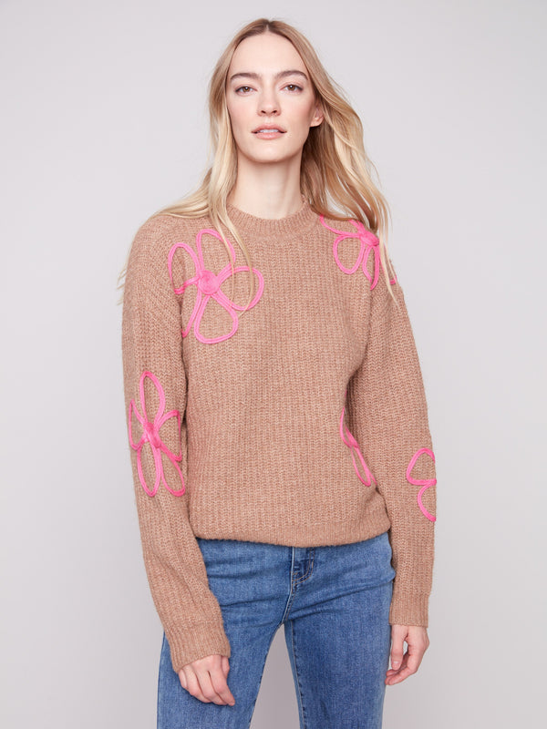 This chic Heather Truffle sweater features eye-catching contrast soutache detail, ideal for any occasion by Charlie B.