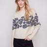 Heather vanilla sweater featuring a relaxed fit and floral jacquard design, perfect for cozy days by Charlie B.