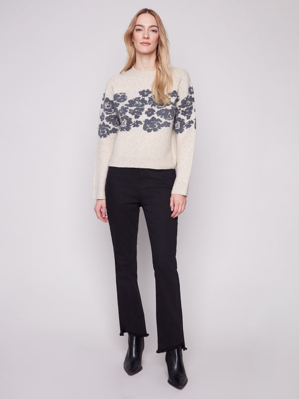 Floral jacquard sweater in heather vanilla, offering a chic relaxed fit and timeless style by Charlie B.