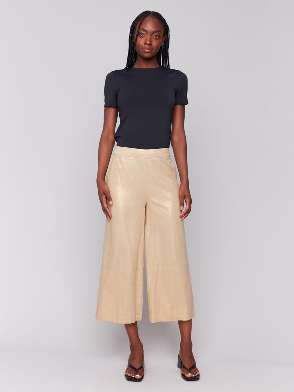 Gold pants with high-rise waist and elastic at back waistband by Charlie B.