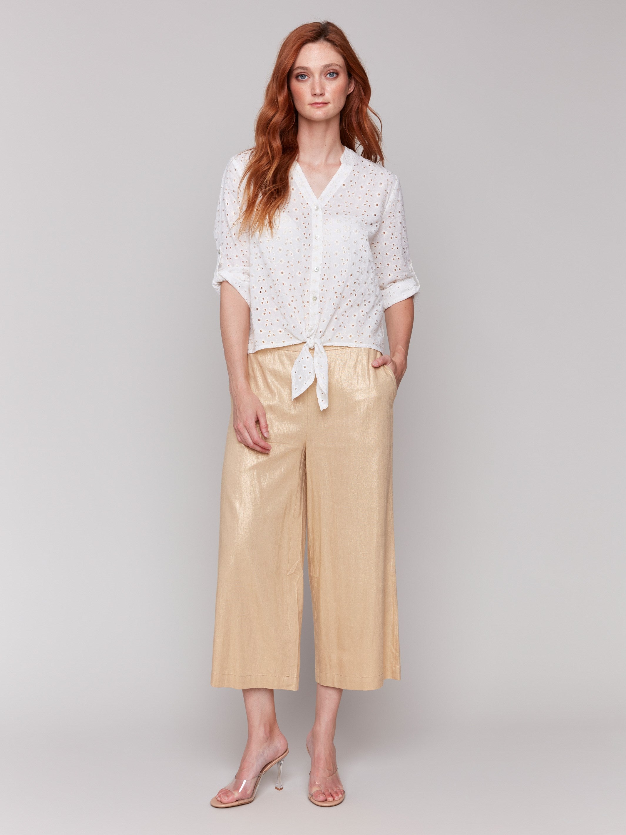 Stylish wide leg design enhances the look of these gold pull-on trousers by Charlie B.