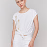 White metallic top with a stylish foil print design by Charlie B.