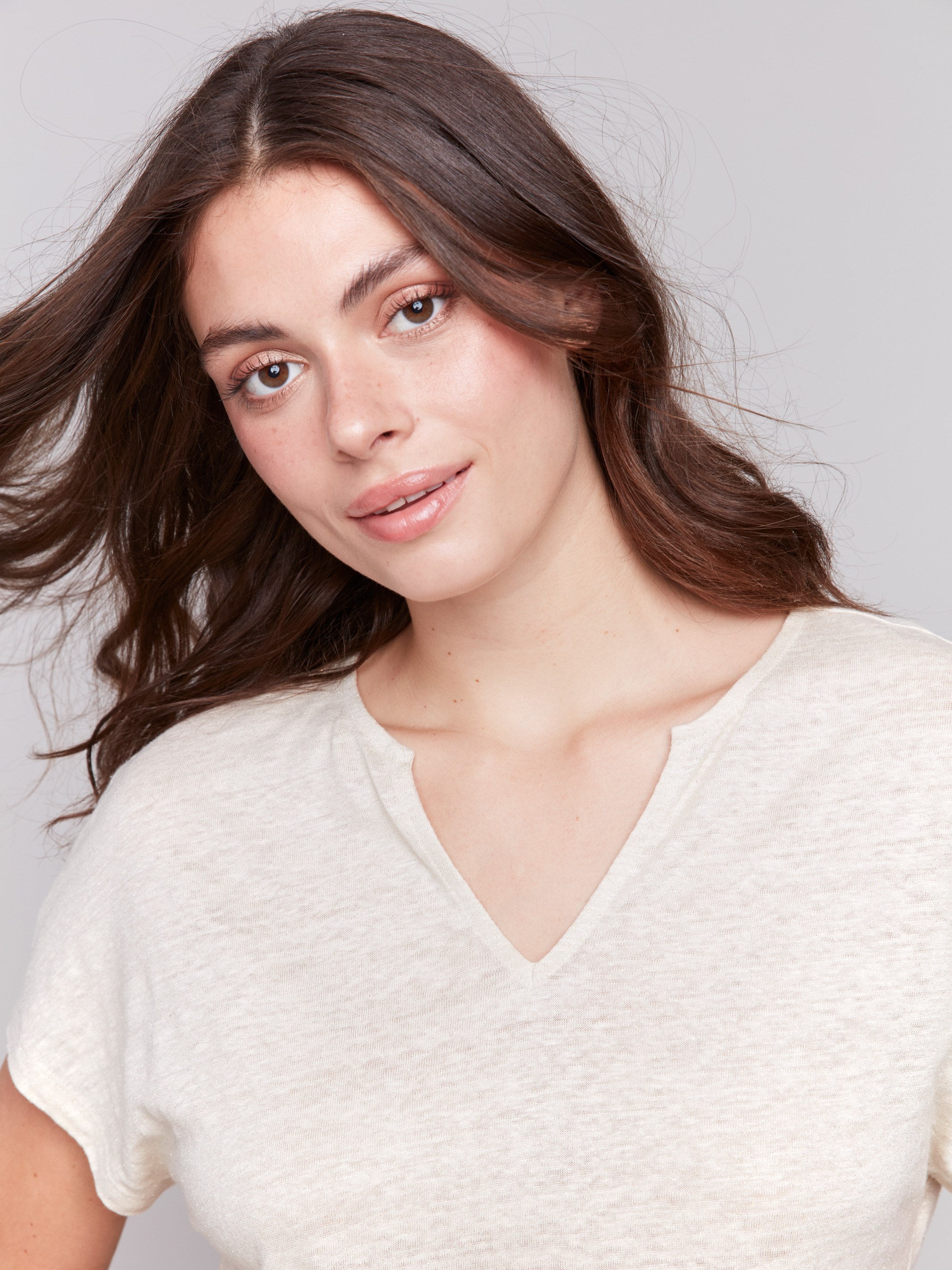 Champagne dolman top featuring a shimmering effect fabric by Charlie B.