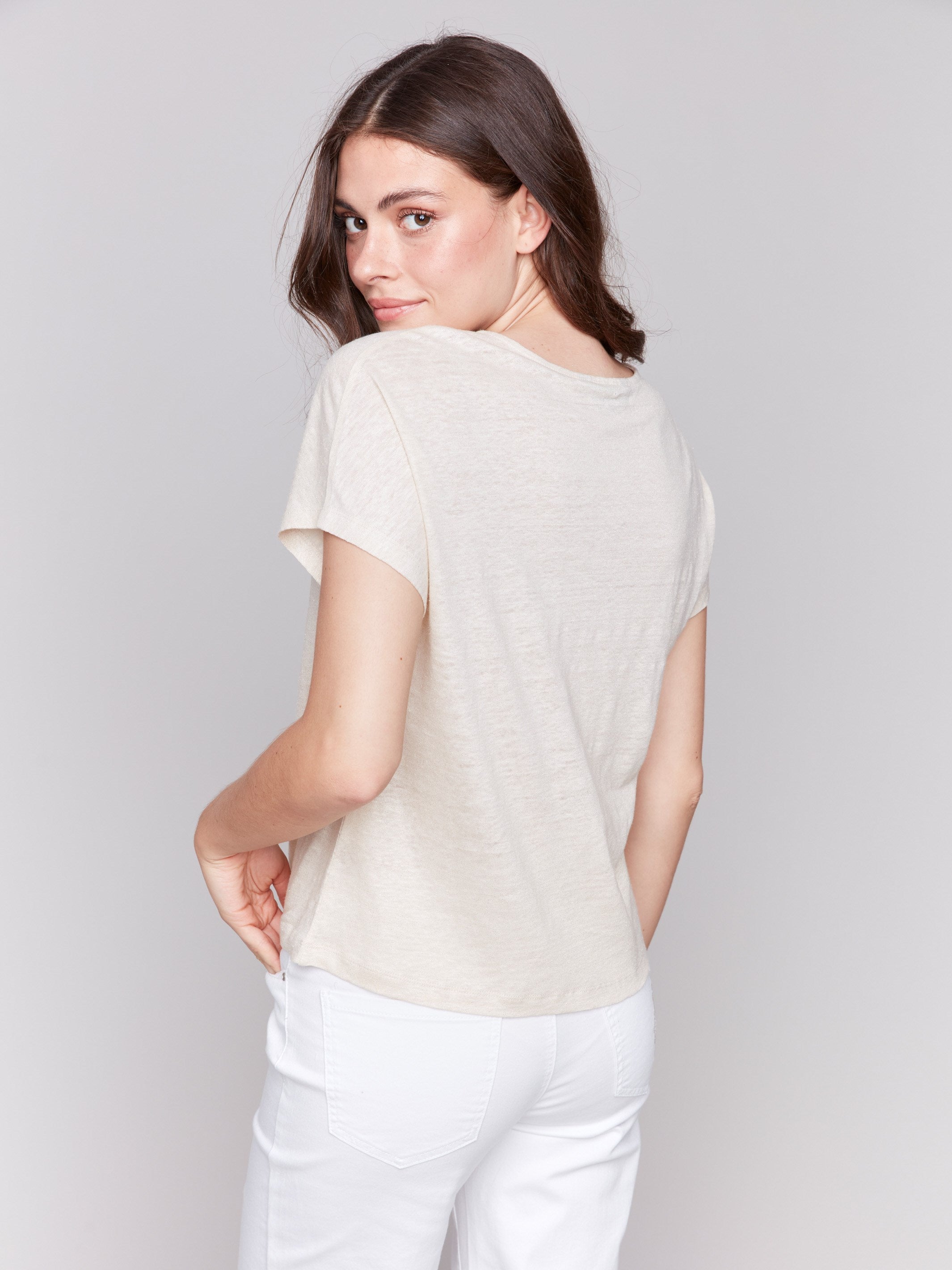 Split neck dolman top in champagne with shimmering fabric by Charlie B.