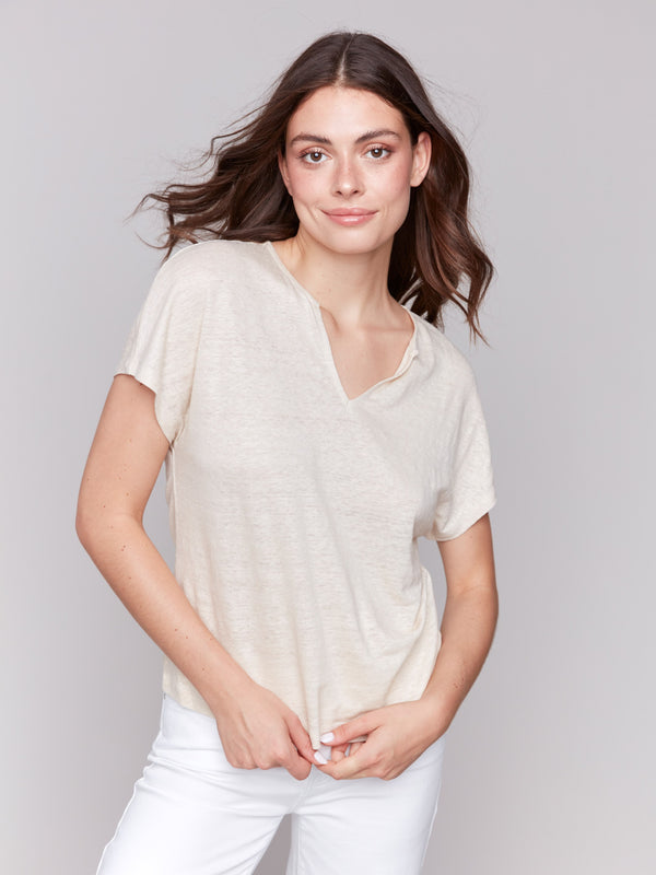 Relaxed fit, foil print dolman top in champagne color by Charlie B.