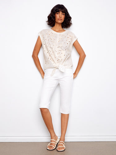 Elegant cap sleeves enhance this gold foiled eyelet blouse, crafted from 100% cotton for comfort by Charlie B.