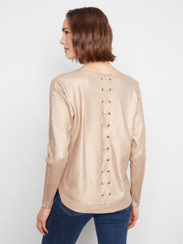 Fashion-forward top highlighted by its unique back lace-up design, offering an edgy twist on classic style by Charlie B.