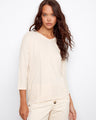 Elegant V-neck top with a relaxed fit and stylish 3/4 sleeves, perfect for any occasion. By Charlie B.