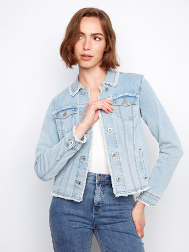 Light blue denim jacket featuring frayed edges and a button front design, adding a touch of casual style. By Charlie B.