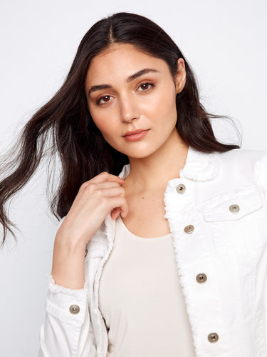 Versatile white jacket with classic button front, effortlessly enhancing both casual and dressy outfits by Charlie B.