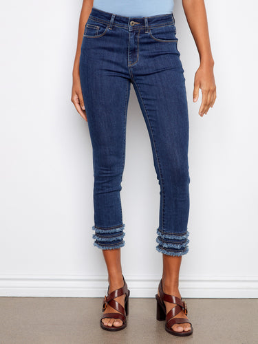 These jeans boast a chic cropped length, ideal for showcasing your favorite footwear. Designed with 5 pockets. By Charlie B.