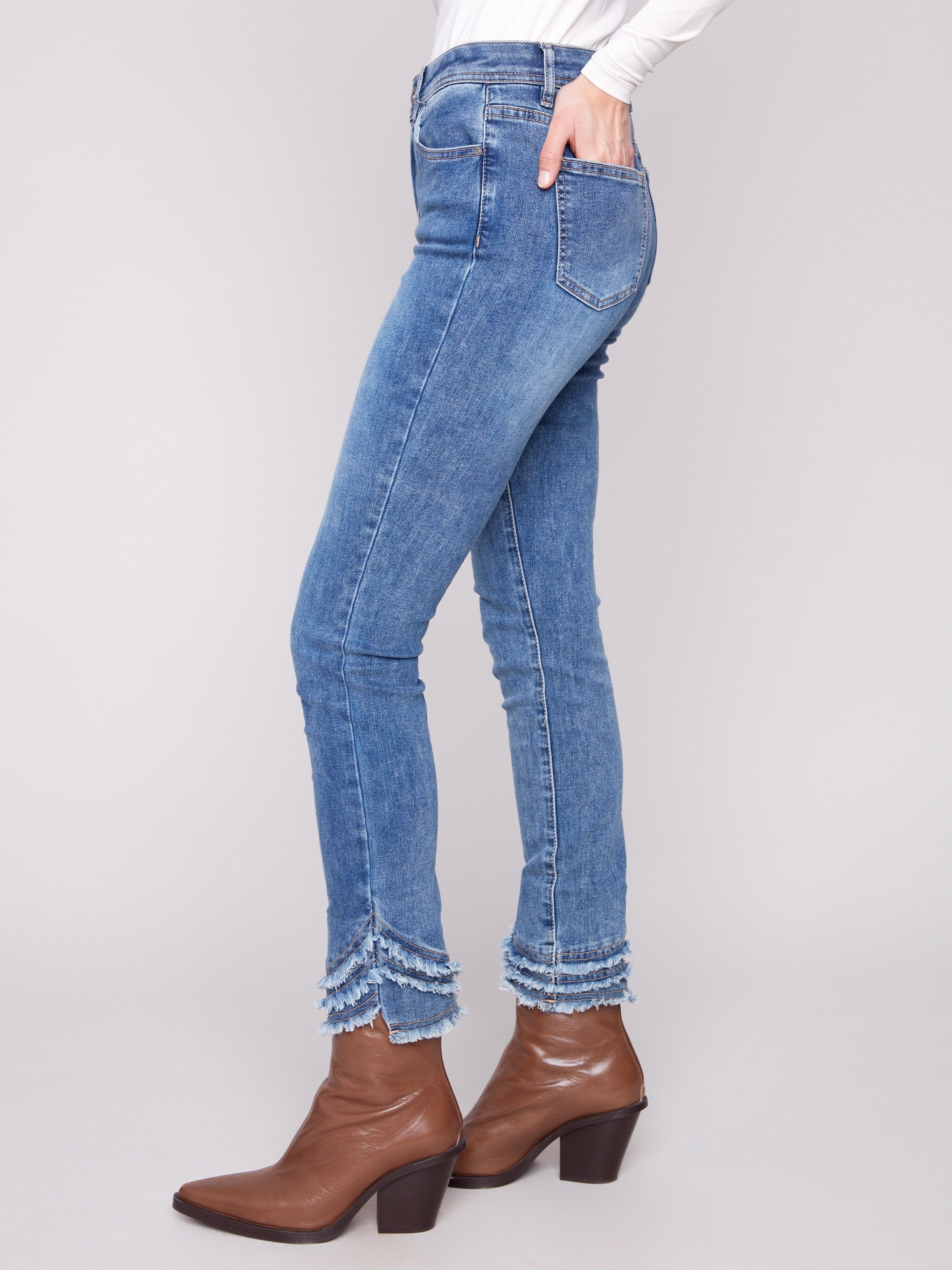 Crafted from stretch denim fabric, these jeans provide a comfortable fit that moves with you by Charlie B.
