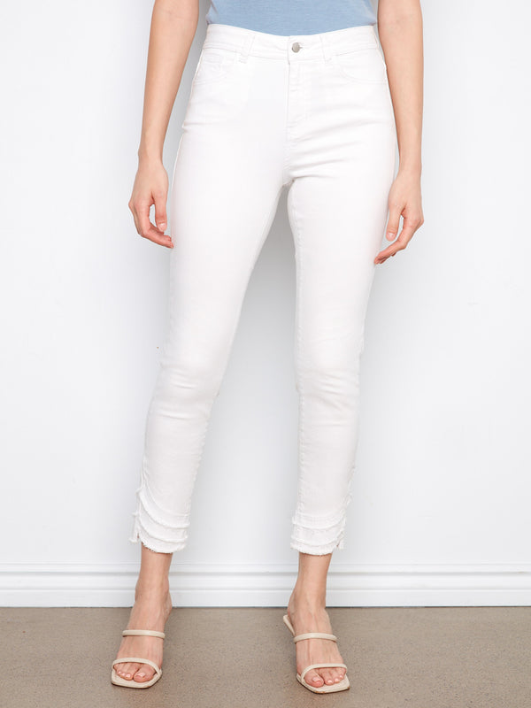 Showcasing frayed hem detail, these jeans add a trendy touch to your casual wardrobe. By Charlie B.