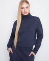 Navy sweater featuring a ribbed mock neck and drop shoulder design, offering a relaxed yet stylish look by Charlie B.