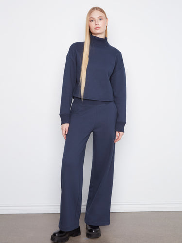 Elegant navy sweater with long sleeves and a comfortable cotton blend, perfect for casual wear by Charlie B.