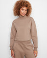 The outfit showcases a stylish drop shoulder design, adding a relaxed touch to the look by Charlie B.