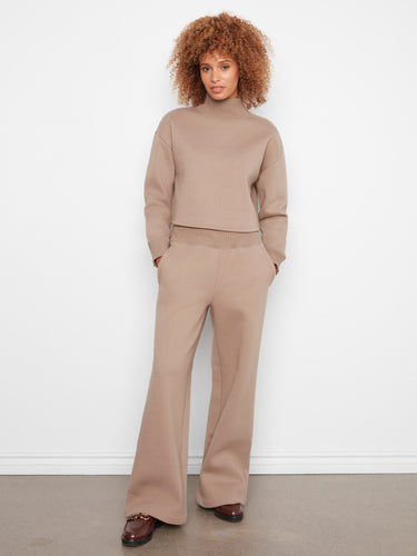 Featuring a ribbed mock neck, this ensemble offers both comfort and sophistication by Charlie B.