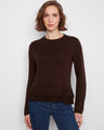 Elegant sweater featuring a classic crew neck design, perfect for any occasion. Made with soft material for comfort. By Charlie B.