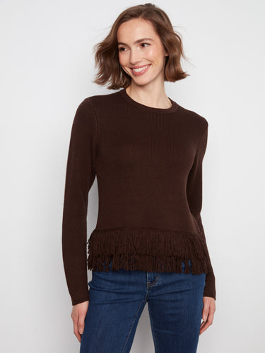 Charming sweater with a unique fringed hem, adding a touch of flair to your outfit. Ideal for casual or dressy looks. By Charlie B.