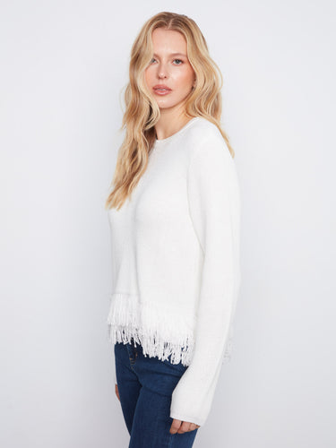 Chic white sweater showcasing its beautiful crew neck design and soft fabric for ultimate comfort. By Charlie B.