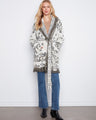 This cozy cardigan features a shawl collar, adding elegance and warmth to your outfit. Perfect for chilly days. By Charlie B.