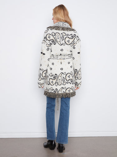 Patch pockets provide practicality and style, making this cardigan both functional and fashionable for everyday wear. By Charlie B.