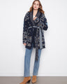 Navy blue cardigan with a shawl collar and geometric jacquard pattern, featuring patch pockets and a self-tie belt by Charlie B.