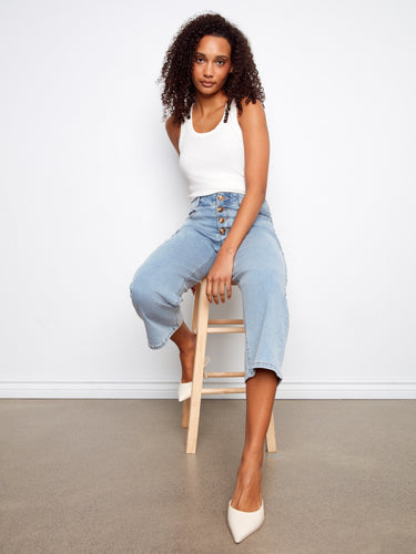 Featuring front buttons, these cropped jeans provide an easy yet fashionable look by Charlie B.