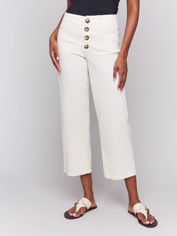 Button-fly closure on natural straight leg twill pants by Charlie B.