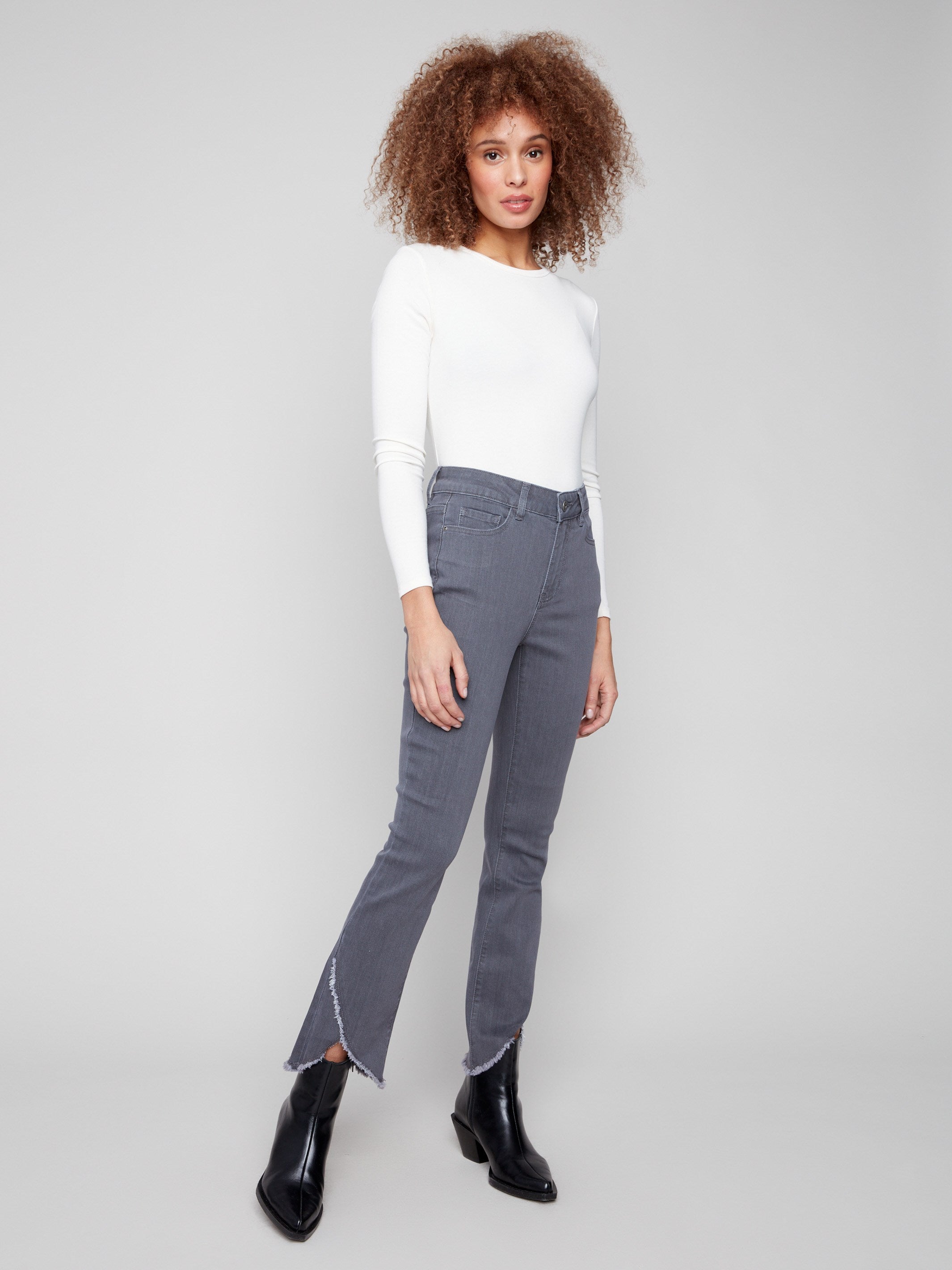 Grey bootcut jeans featuring a stylish front tulip hem, crafted in stretch denim for comfort and flexibility by Charlie B.