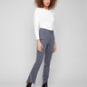 Grey bootcut jeans featuring a stylish front tulip hem, crafted in stretch denim for comfort and flexibility by Charlie B.