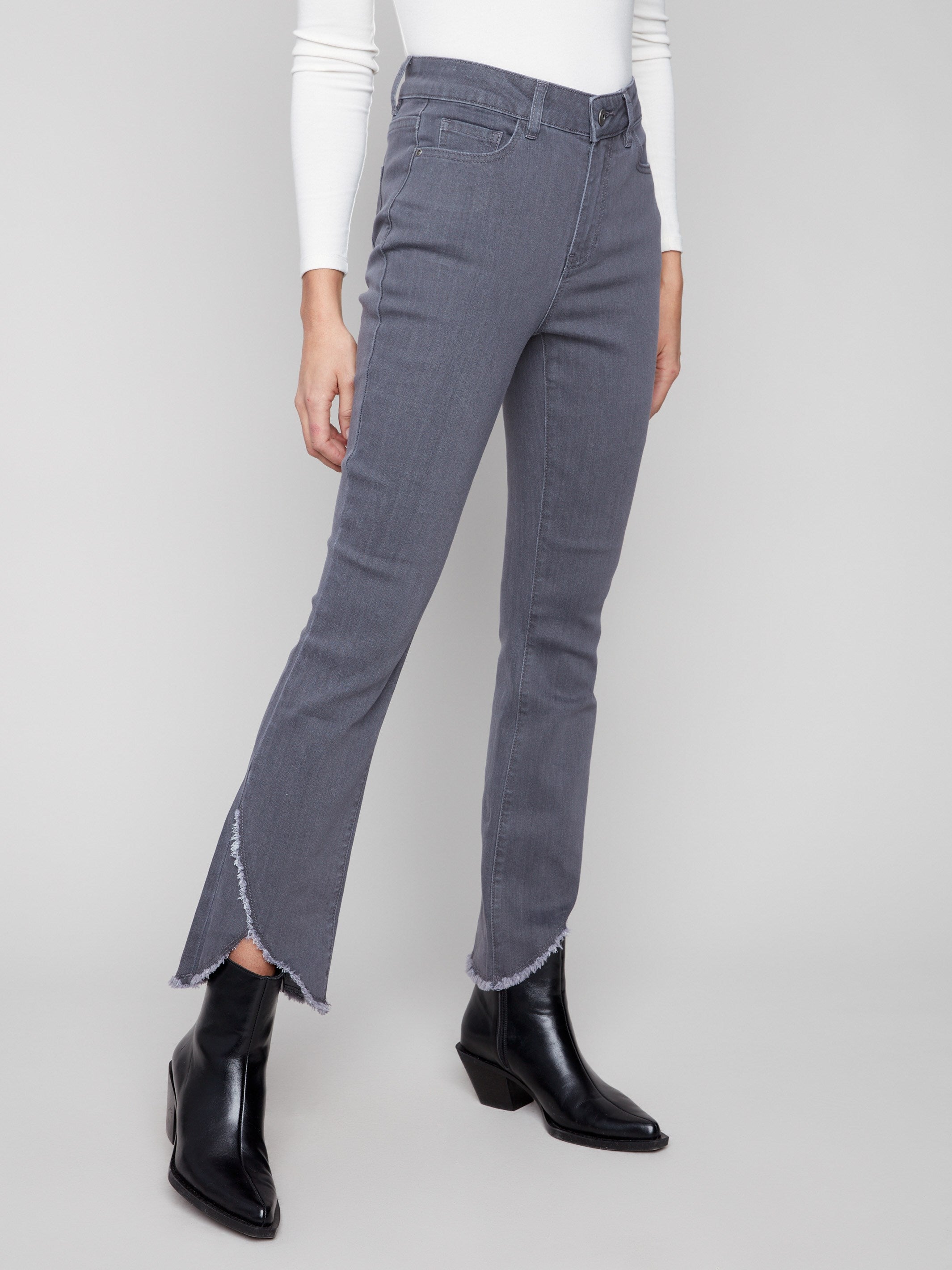 Chic grey jeans with frayed hem detail and regular rise, offering a modern twist on classic bootcut style by Charlie B.