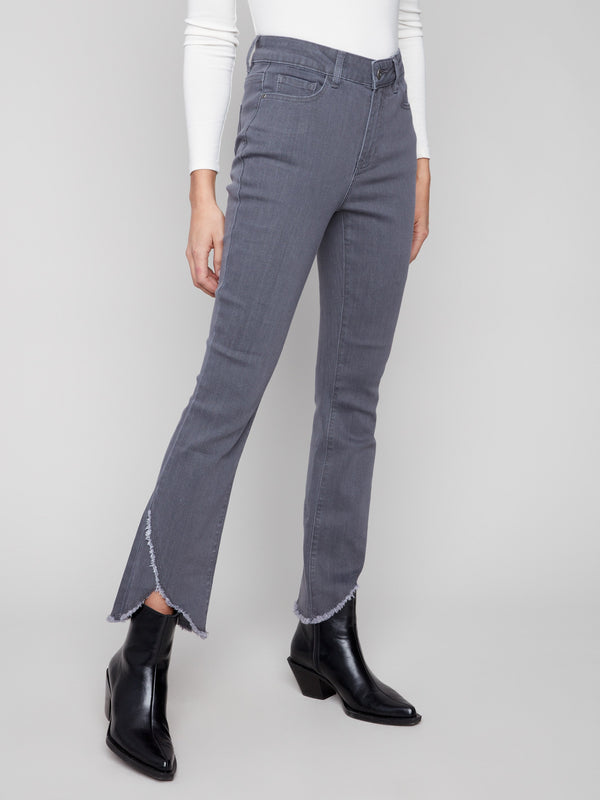Chic grey jeans with frayed hem detail and regular rise, offering a modern twist on classic bootcut style by Charlie B.