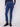 These jeans showcase a frayed hem detail, adding a touch of edge to the classic indigo design by Charlie B.