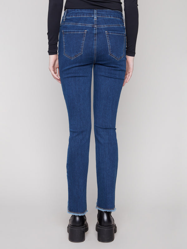 Designed with stretch denim, these indigo jeans offer flexibility and ease of movement by Charlie B.