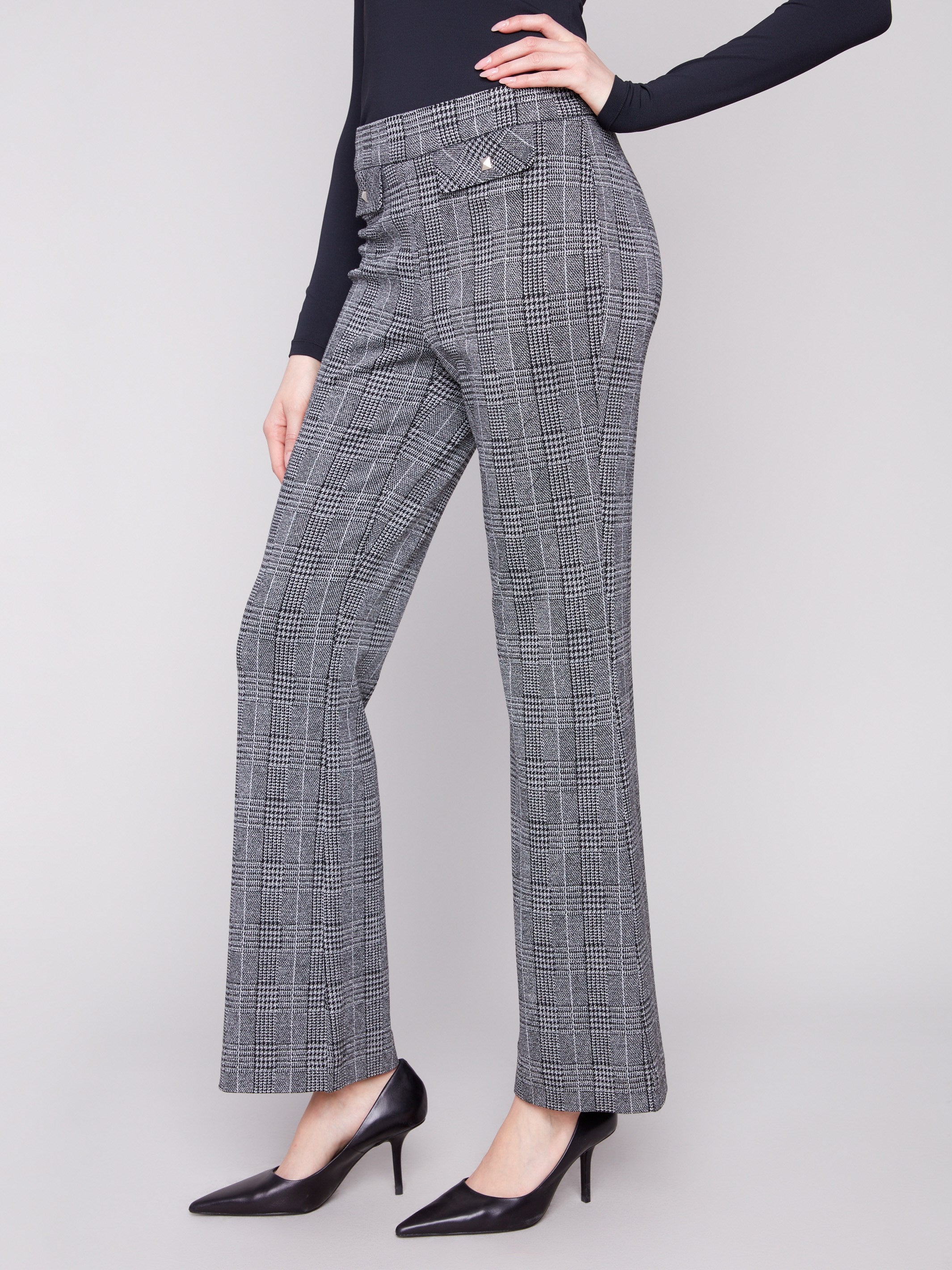 Designed with lurex thread, these charcoal glen plaid flare pants add a subtle shimmer to your ensemble by Charlie B.