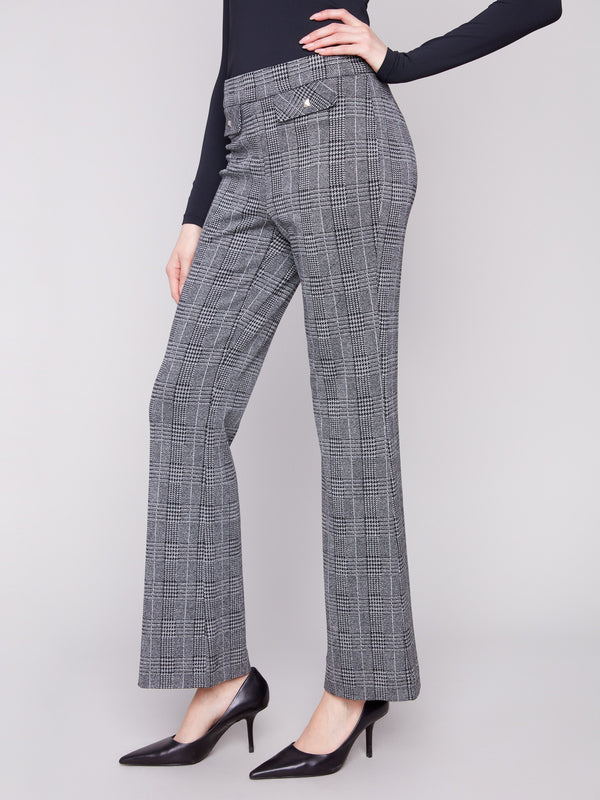 Designed with lurex thread, these charcoal glen plaid flare pants add a subtle shimmer to your ensemble by Charlie B.