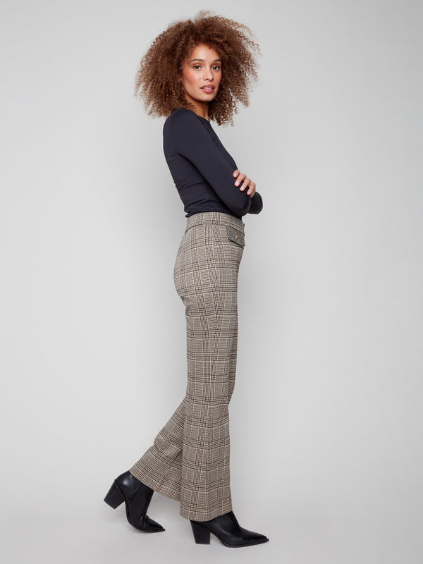 Glen plaid flare pants showcasing a chic stretch fabric for comfort and style, complete with mid-rise waist by Charlie B.