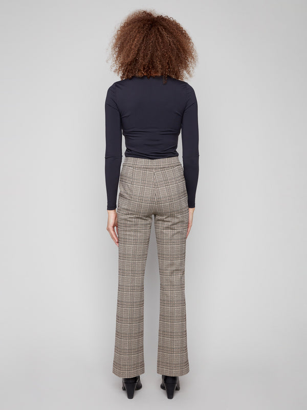 Elegant glen plaid flare pants featuring luxurious lurex thread details and sophisticated long length design by Charlie B.