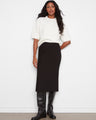 This skirt features a straight fit, offering a sleek silhouette perfect for any occasion. By Charlie B.