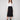 Black crepe skirt with a chic midi length, perfect for versatile styling by Charlie B.