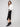 Stylish black crepe skirt with practical front patch pockets, blending fashion and function by Charlie B.